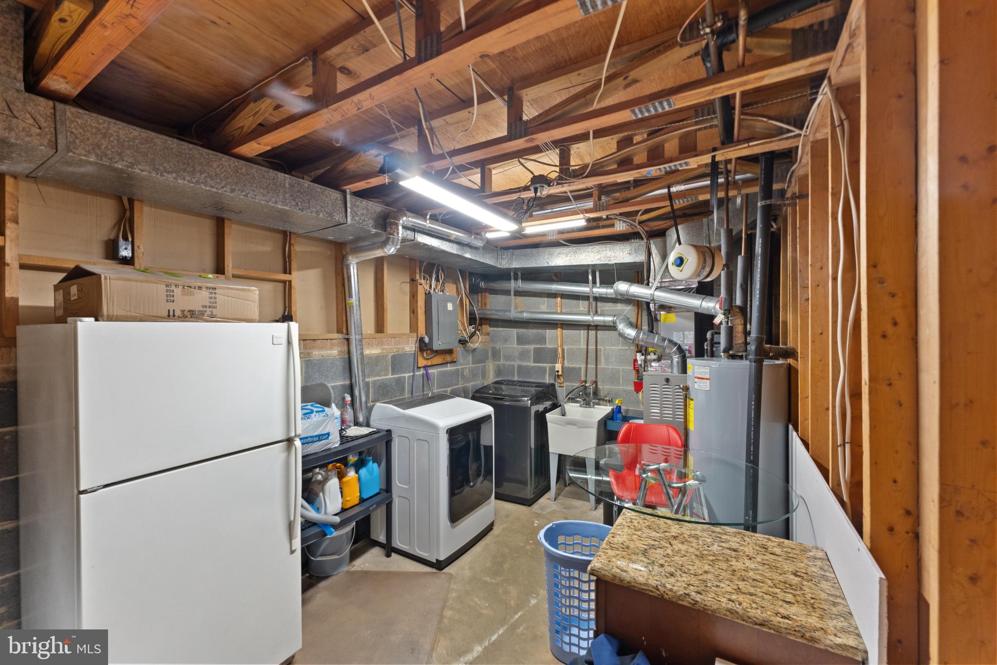 11 Briarstone Lane Gaithersburg, MD 20877 - Photo 28 of 31 a utility room with dryer and washer