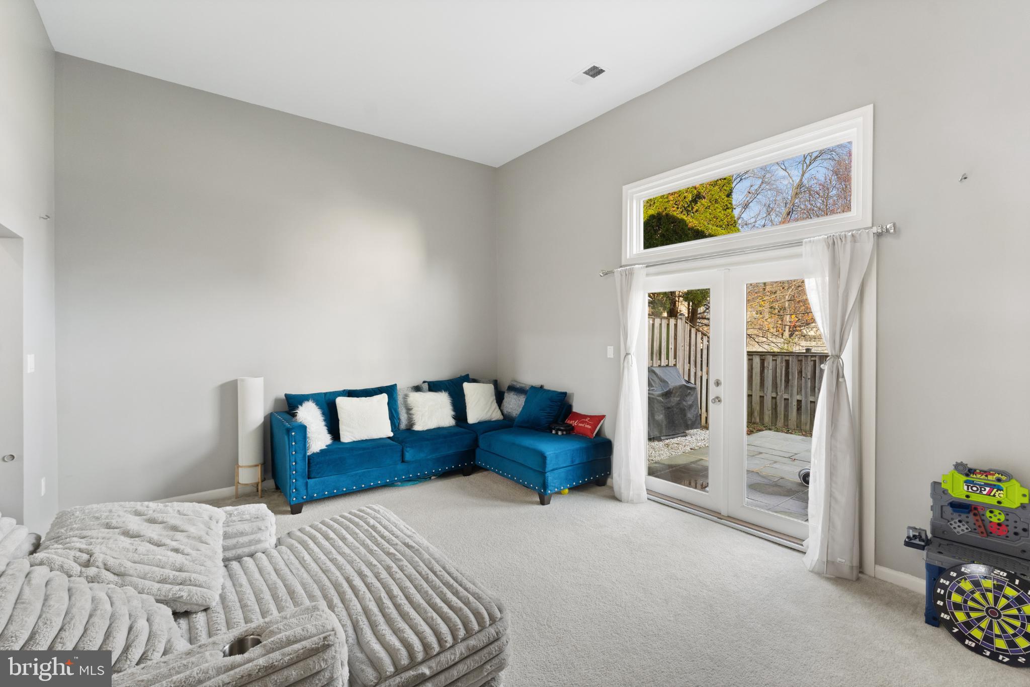 11 Briarstone Lane Gaithersburg, MD 20877 - Photo 4 of 31 a bed room with a bed and a painting on the wall