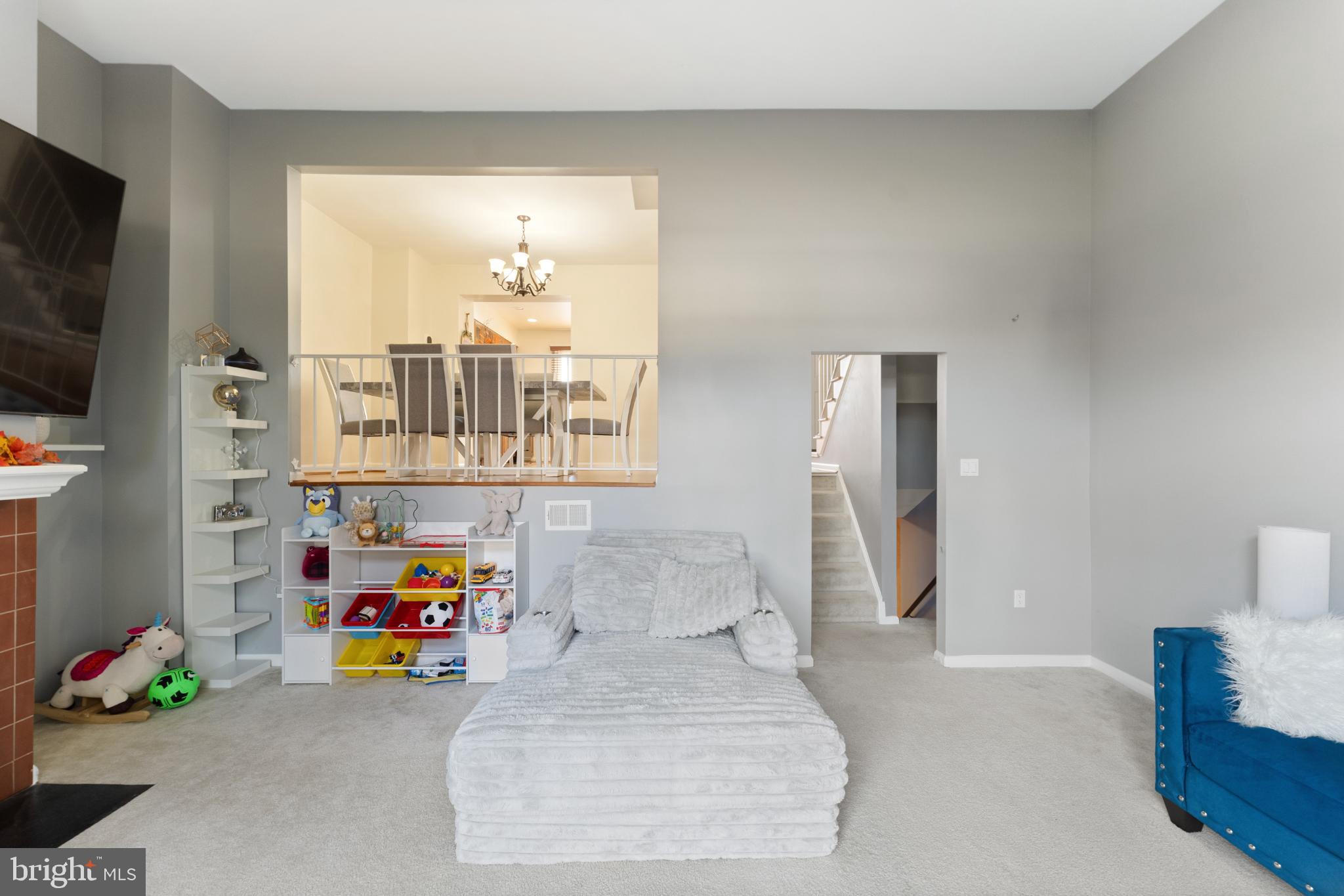 11 Briarstone Lane Gaithersburg, MD 20877 - Photo 6 of 31 a bedroom with furniture and a flat screen tv