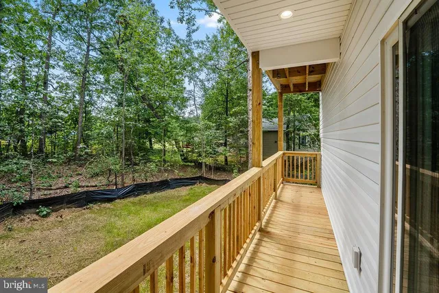 a view of a hallway with windows
