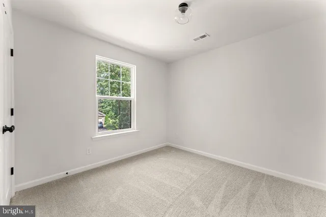 a view of a window in a bathroom