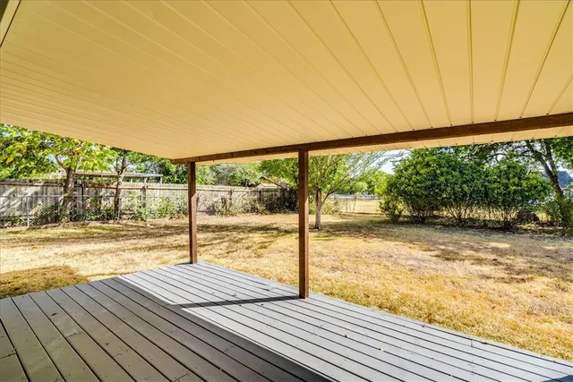 a bathroom with a sink a toilet and vanity