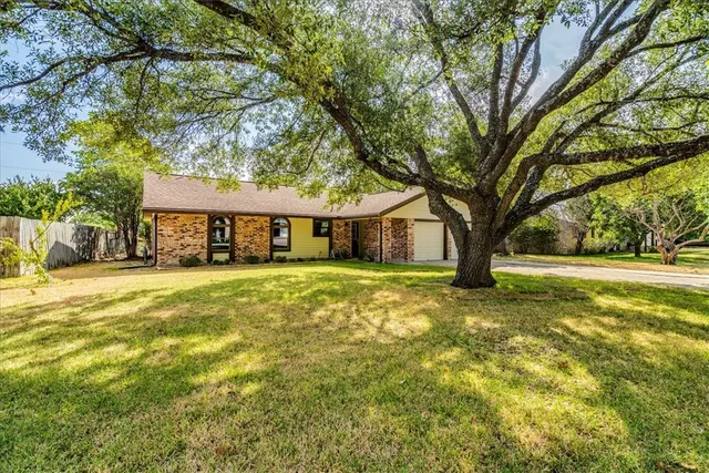 a view of a swimming pool with an outdoor space