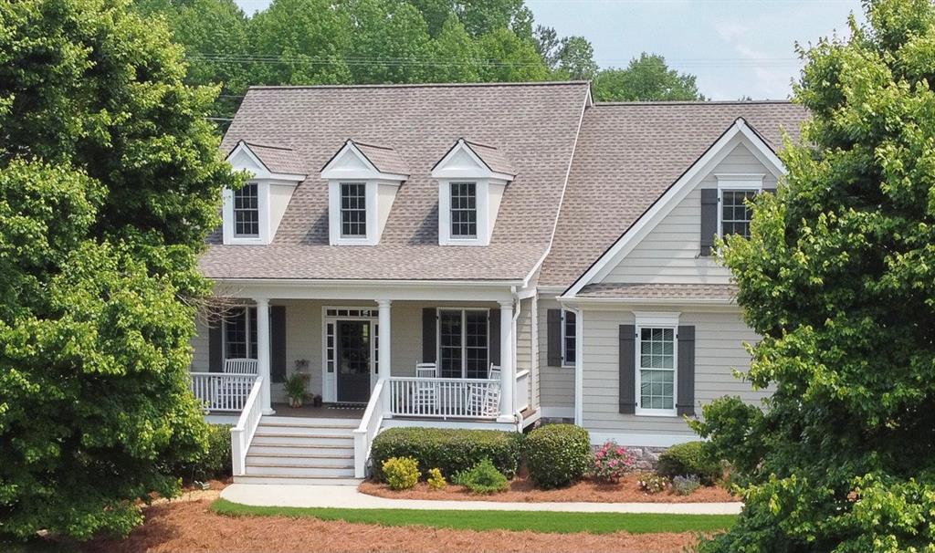 6420 Riley Manor Way Cumming, GA 30028 - Photo 1 of 1 a view of a yard in front of house