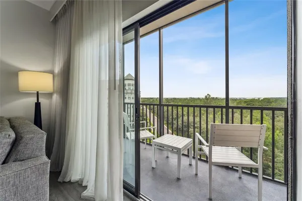 a view of a balcony with chair