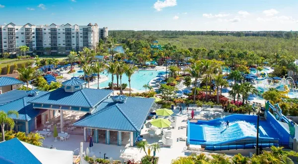 a view of swimming pool with sitting area