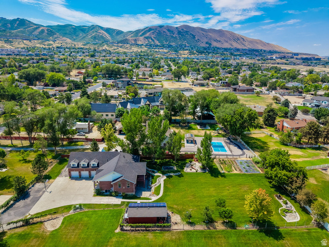 13658 South Fort Street Draper, UT 84020 - Photo 4 of 87 Expansive property featuring a brick residence with a three-car garage and a paved driveway