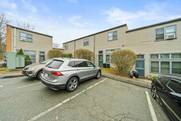 a car parked in front of a house