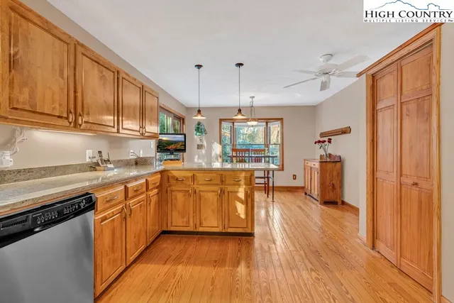 a dining room with furniture window wooden floor