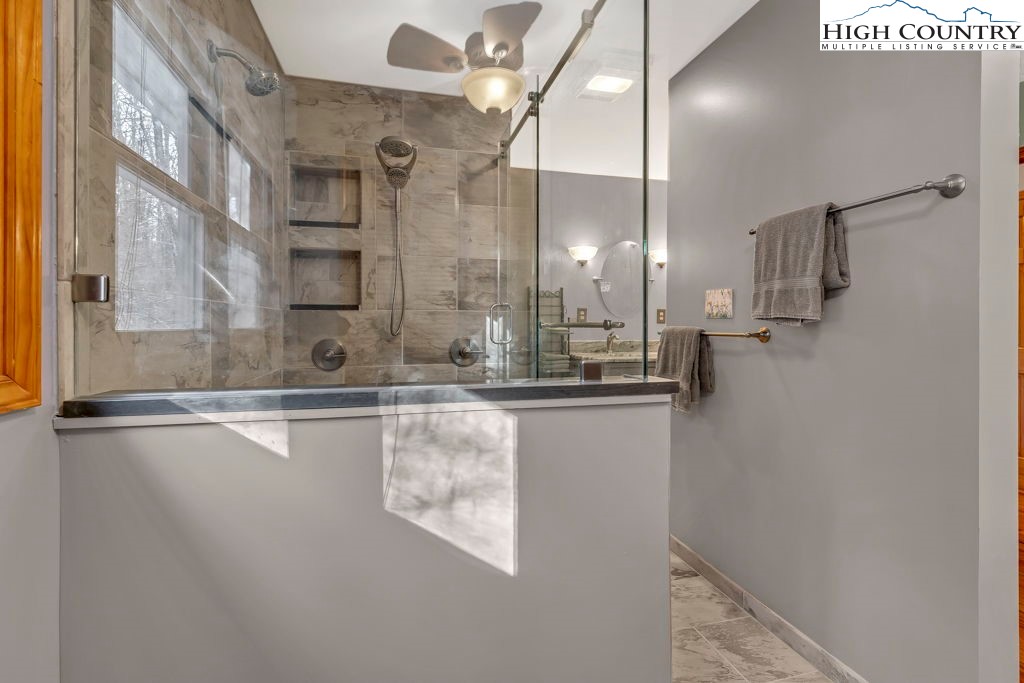 472 Virgil's Lane Boone, NC 28607 - Photo 26 of 44 a bathroom with a shower and a sink