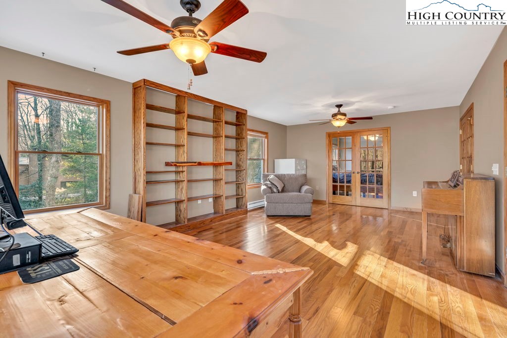 472 Virgil's Lane Boone, NC 28607 - Photo 30 of 44 a living room with furniture and a fireplace