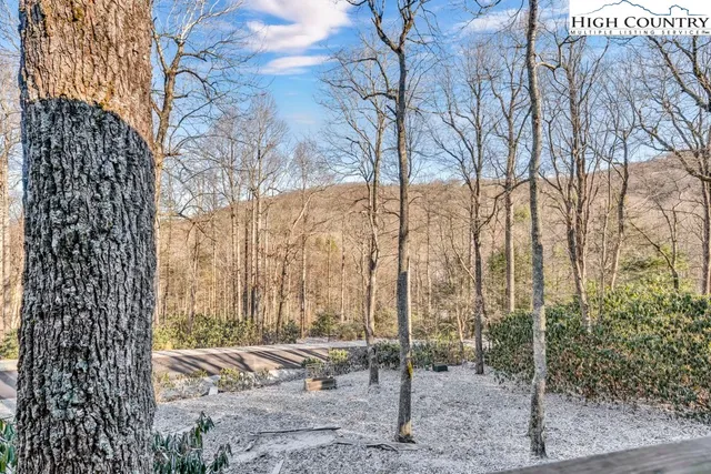 a view of porch with wooden floor