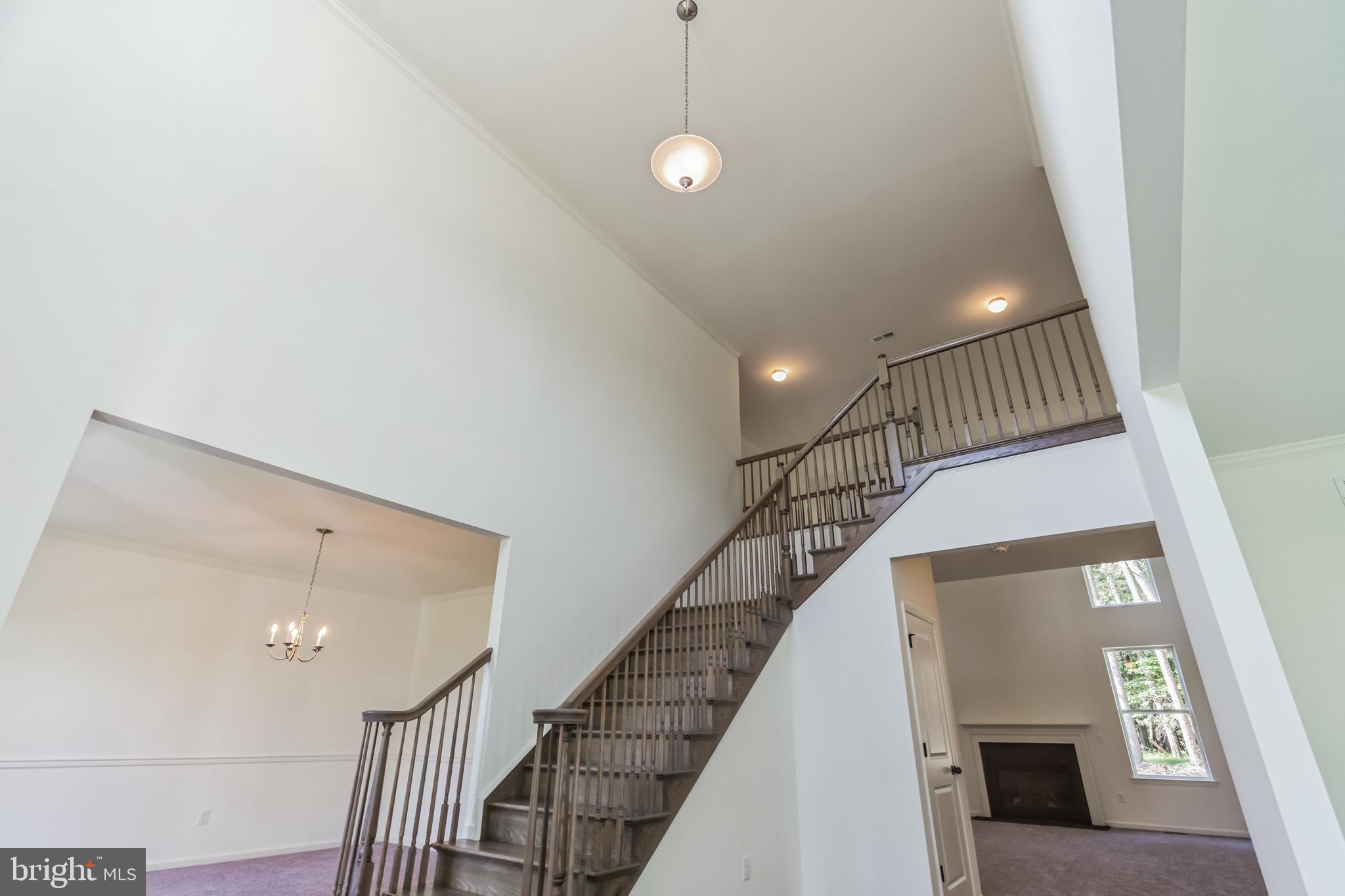 848 Saw Mill Road, Unit D Townsend, DE 19734 - Photo 15 of 53 a view of entryway and hall with wooden floor