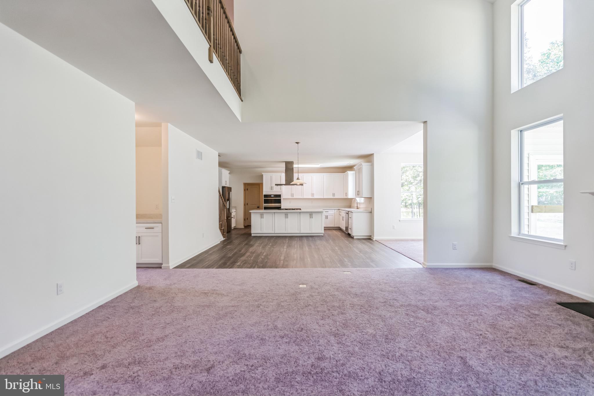 848 Saw Mill Road, Unit D Townsend, DE 19734 - Photo 25 of 53 a view of livingroom with furniture and workspace