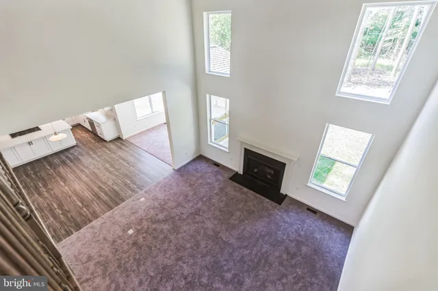 an entryway with wooden floor