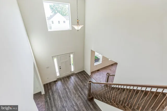 a view of a hallway with closet area
