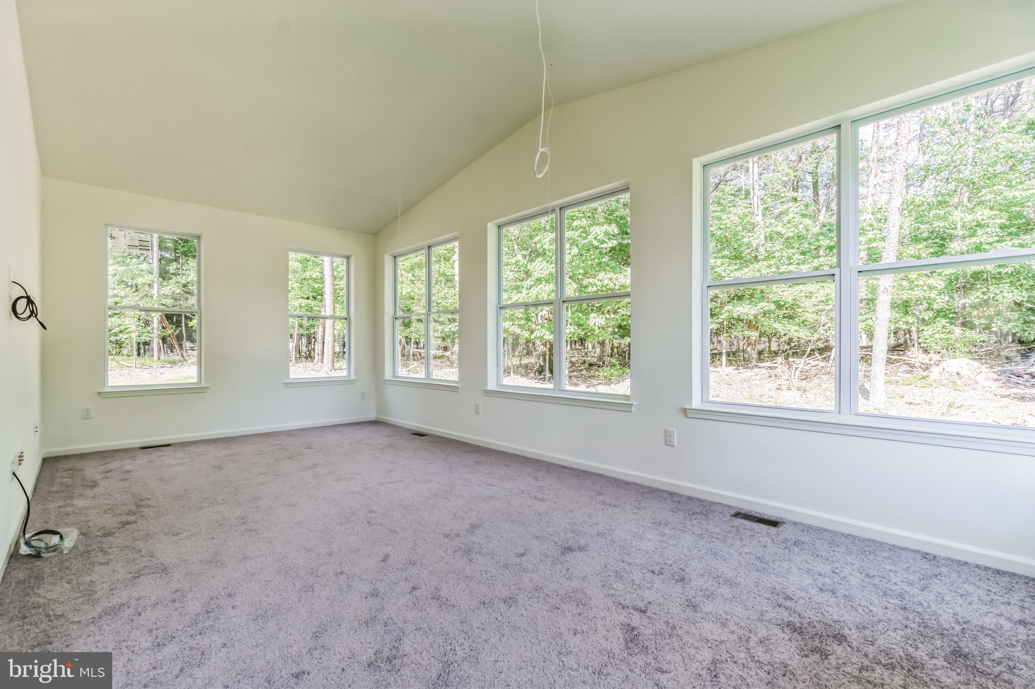 848 Saw Mill Road, Unit D Townsend, DE 19734 - Photo 33 of 53 a view of an empty room with a window