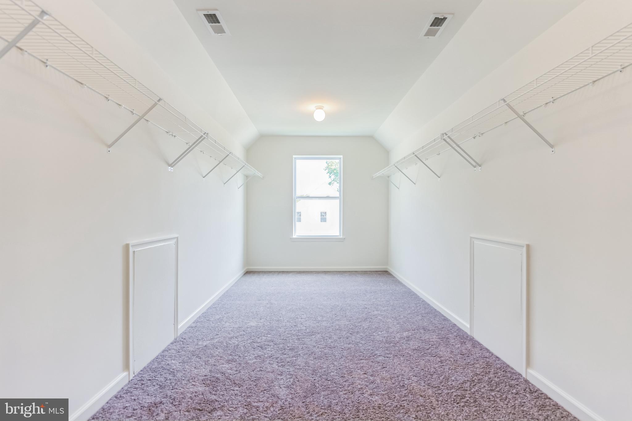 848 Saw Mill Road, Unit D Townsend, DE 19734 - Photo 38 of 53 an empty room with windows