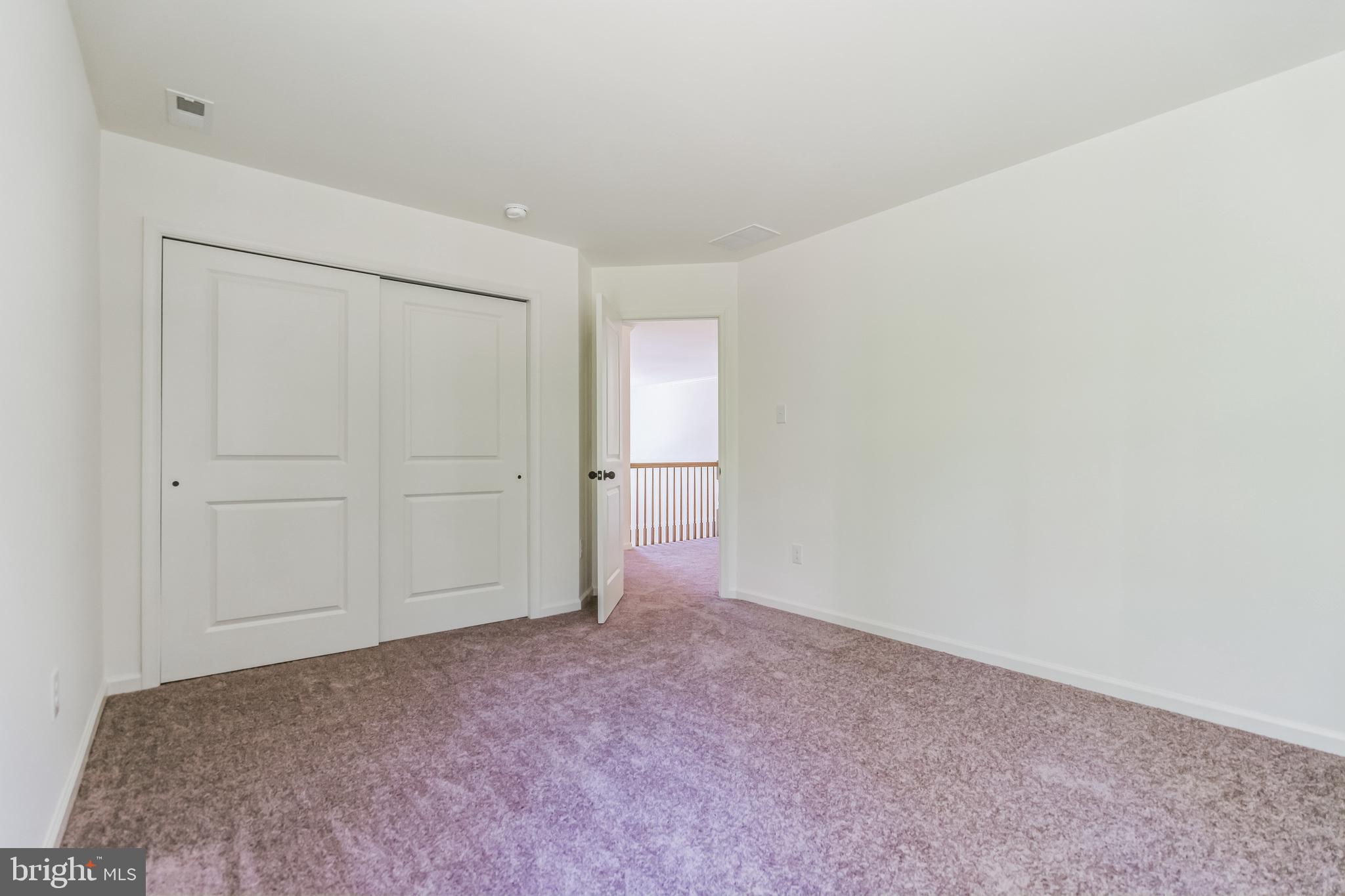 848 Saw Mill Road, Unit D Townsend, DE 19734 - Photo 47 of 53 a view of an empty room and closet area