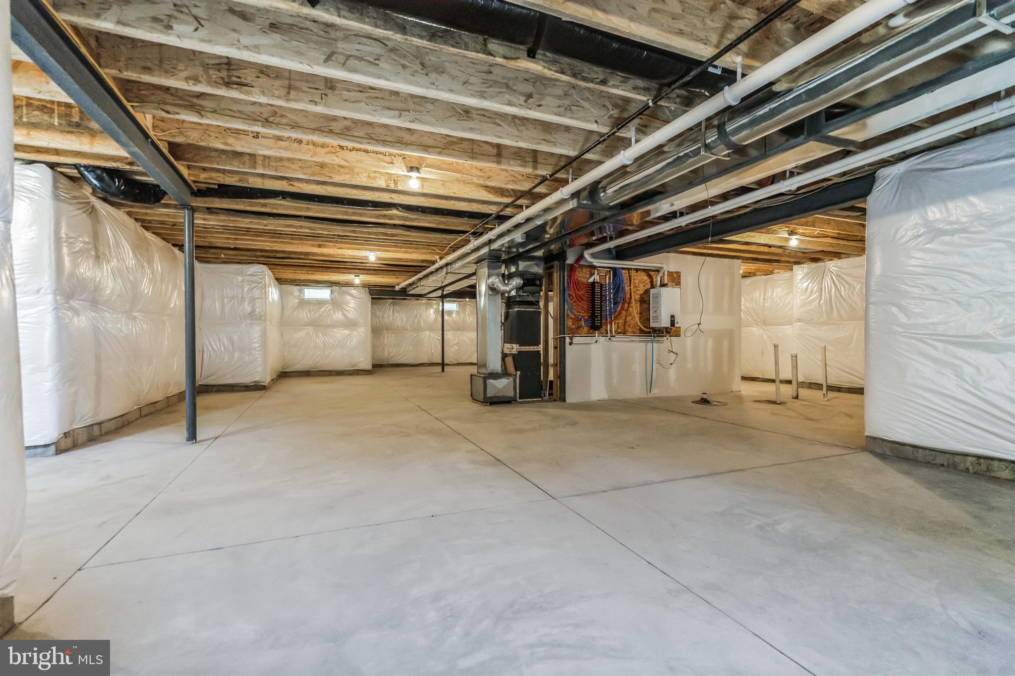 848 Saw Mill Road, Unit D Townsend, DE 19734 - Photo 53 of 53 a view of empty room with wooden ceiling