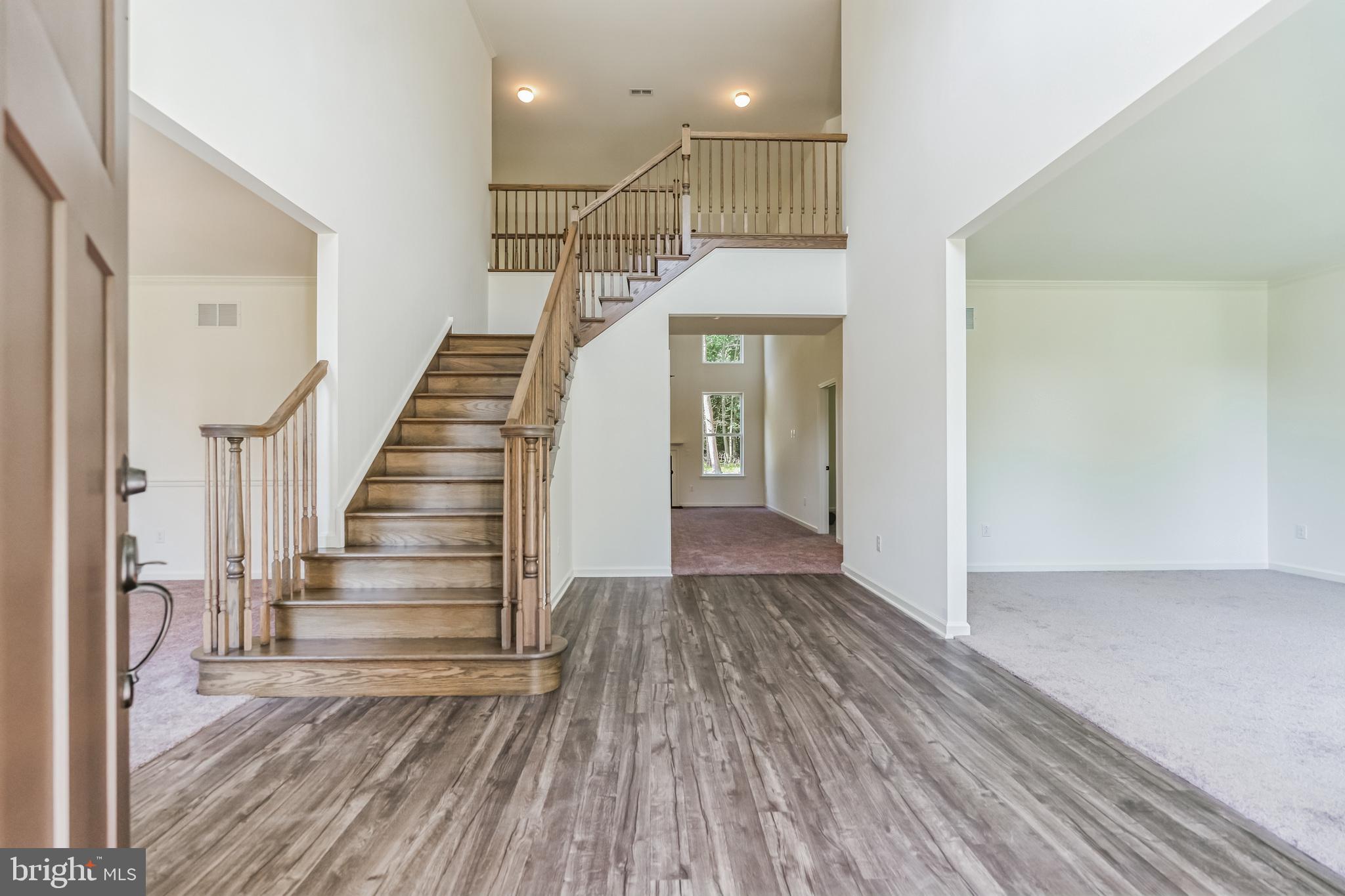848 Saw Mill Road, Unit D Townsend, DE 19734 - Photo 10 of 53 a view of entryway with wooden floor