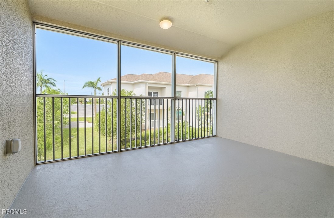 3304 Skyline Boulevard, Unit 202 Cape Coral, FL 33914 - Photo 17 of 20 a view of a balcony with city view