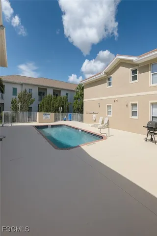 a view of a car park in front of house
