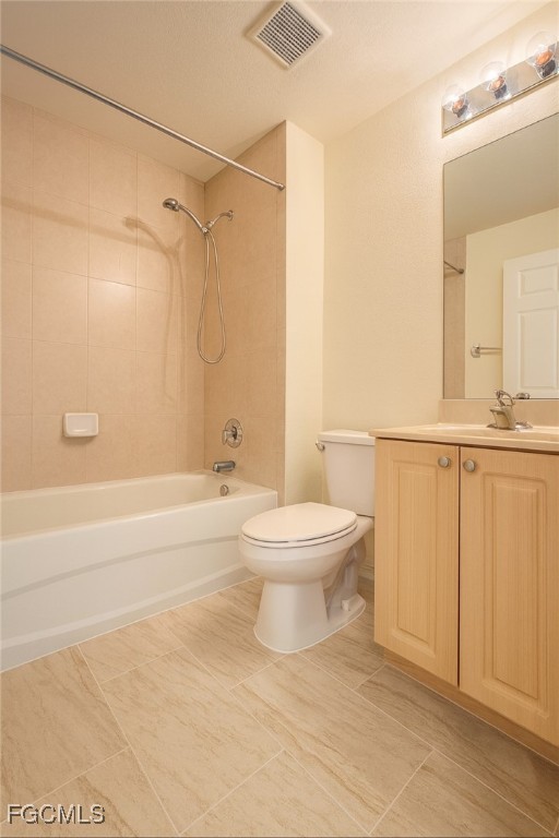 3304 Skyline Boulevard, Unit 202 Cape Coral, FL 33914 - Photo 9 of 20 a bathroom with a toilet a sink and shower