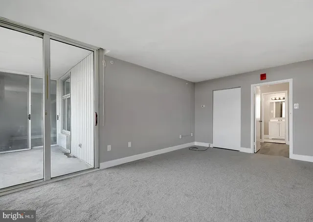 a bathroom with a sink toilet vanity and shower