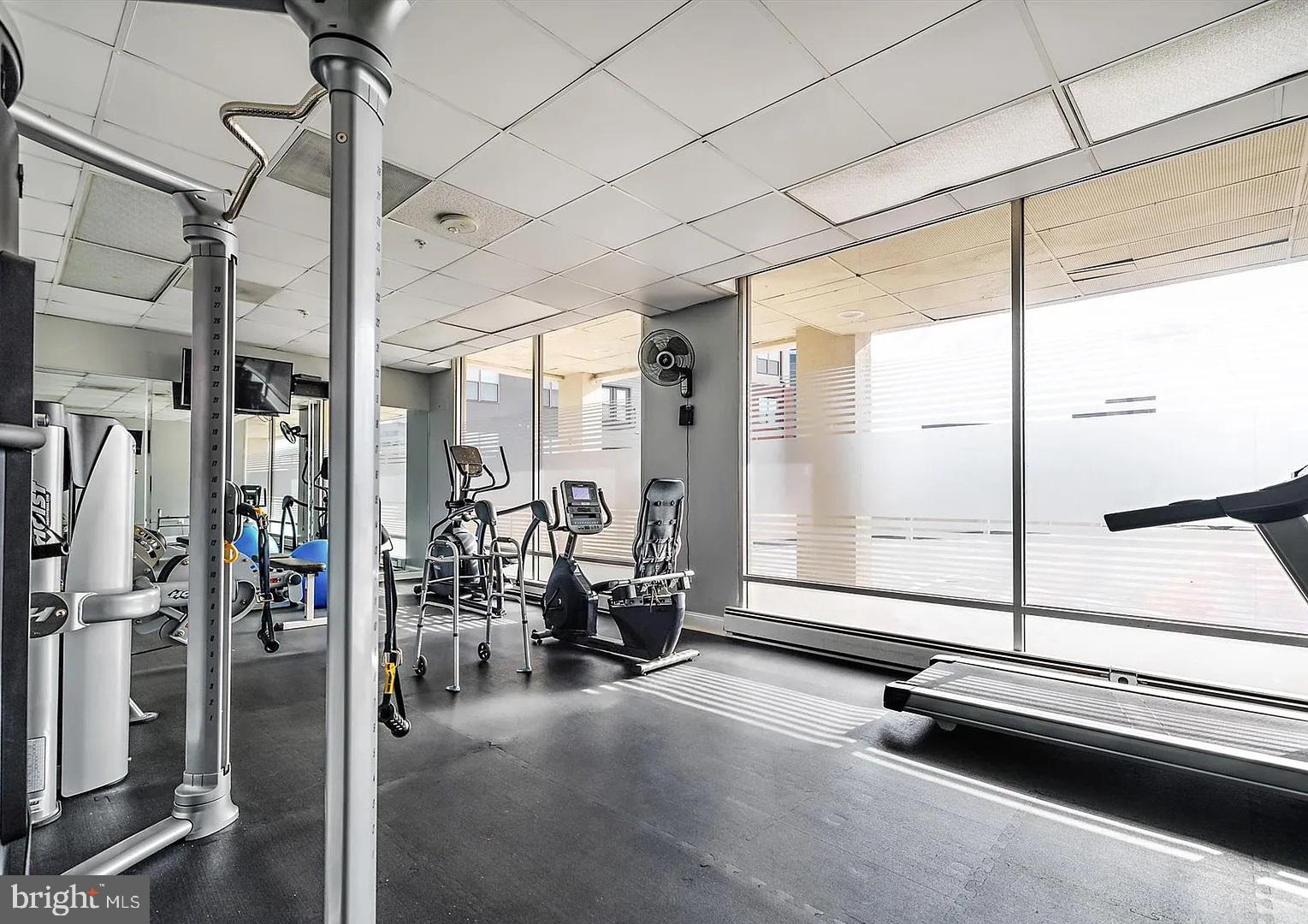 28 Allegheny Avenue, Unit 2502 Towson, MD 21204 - Photo 21 of 22 a room with gym equipment and large window