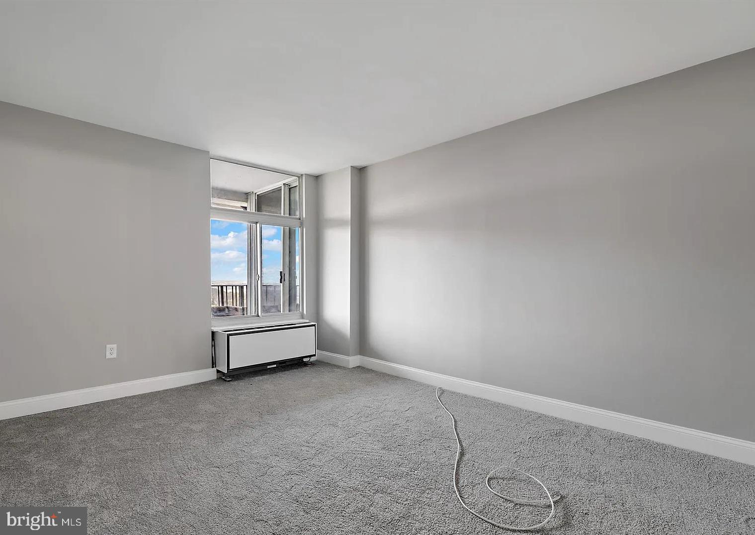 28 Allegheny Avenue, Unit 2502 Towson, MD 21204 - Photo 10 of 22 a view of empty room with air conditioner and window