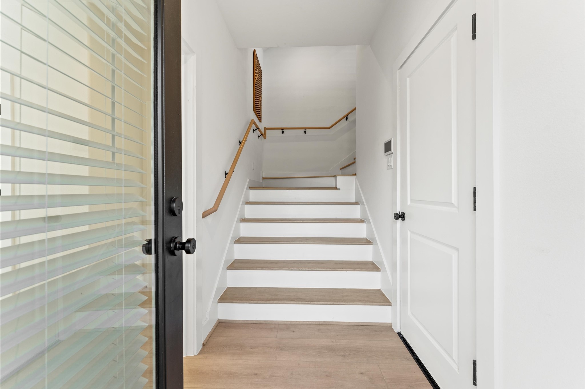 7805 Amelia Road, Unit B Houston, TX 77055 - Photo 26 of 35 Entry way. Photos are from a previous NJA Homes development. Floor plan, finishes & specifications may vary.
