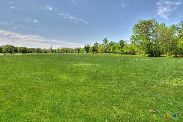 a view of a chairs and table on the terrace