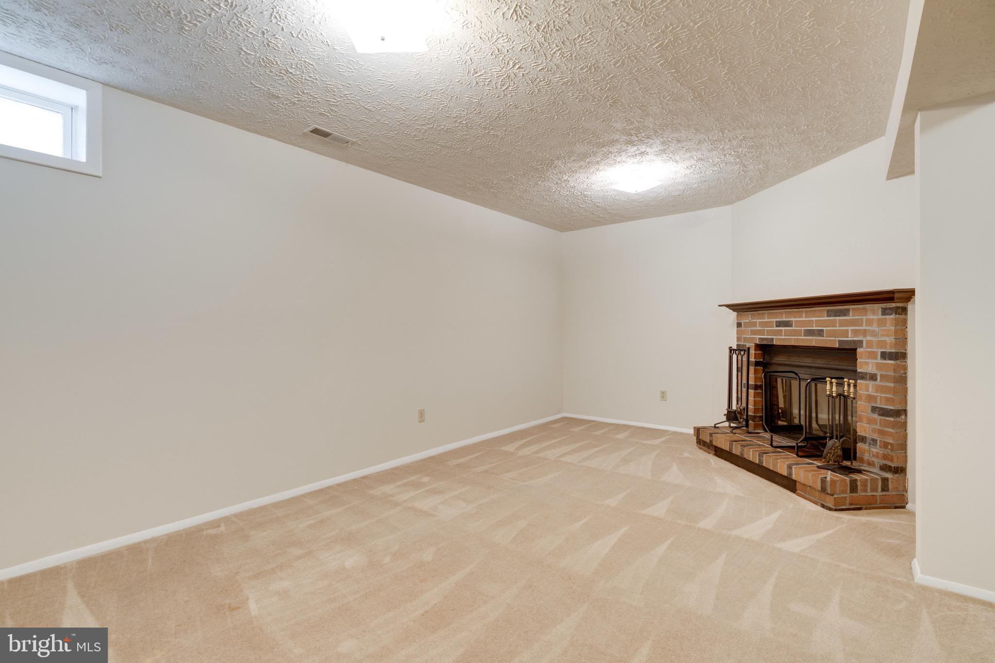 8765 Newington Commons Road Lorton, VA 22079 - Photo 37 of 51 Fireplace inRec Room