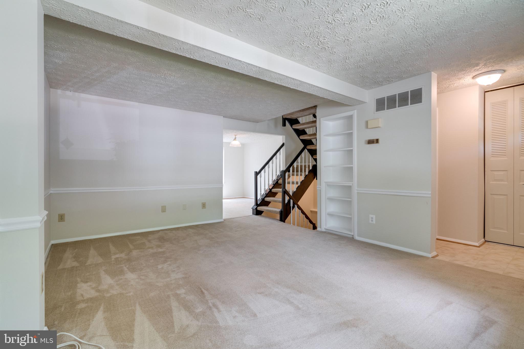 8765 Newington Commons Road Lorton, VA 22079 - Photo 7 of 51 Living Room with built in Shelves