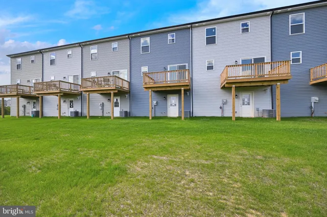 a view of a house with a big yard