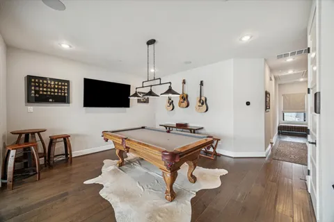 a room with furniture and a flat screen tv