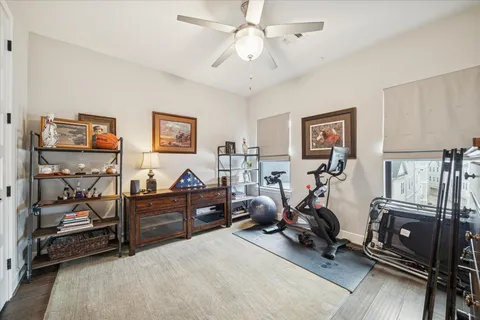 a view of a room with workspace and a window