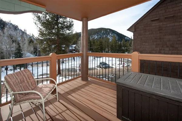 a view of a balcony with a door