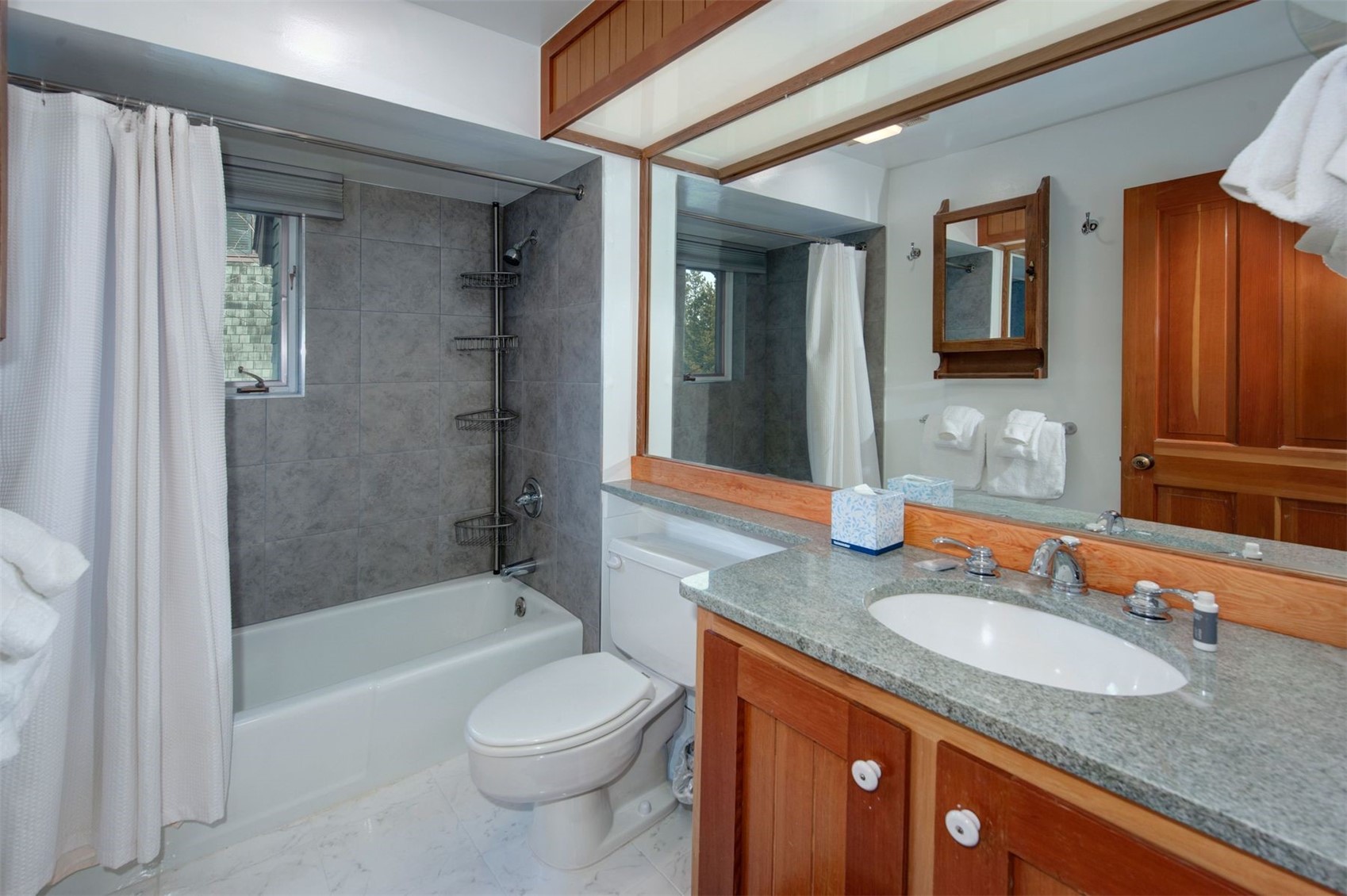 352 Wild Irishman Road, Unit 1907 Keystone, CO 80435 - Photo 22 of 43 a bathroom with a granite countertop sink toilet and shower