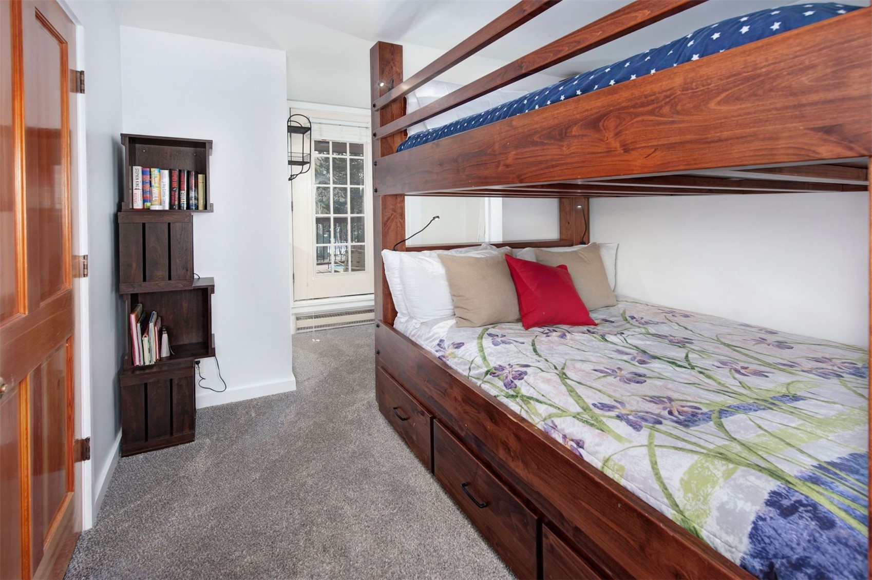 352 Wild Irishman Road, Unit 1907 Keystone, CO 80435 - Photo 24 of 43 a bed sitting in a bedroom next to a window