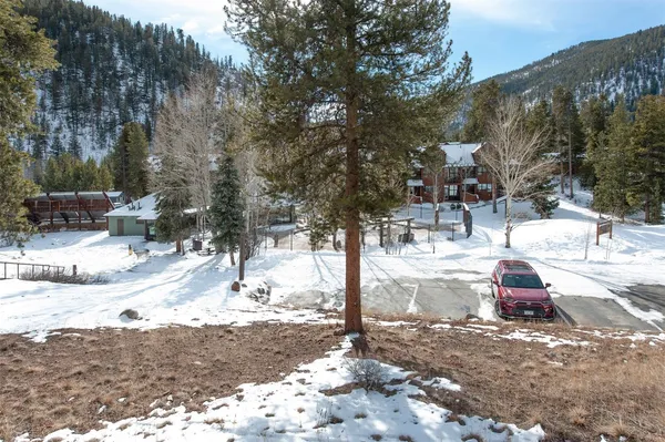 a view of a snow on the side of the road