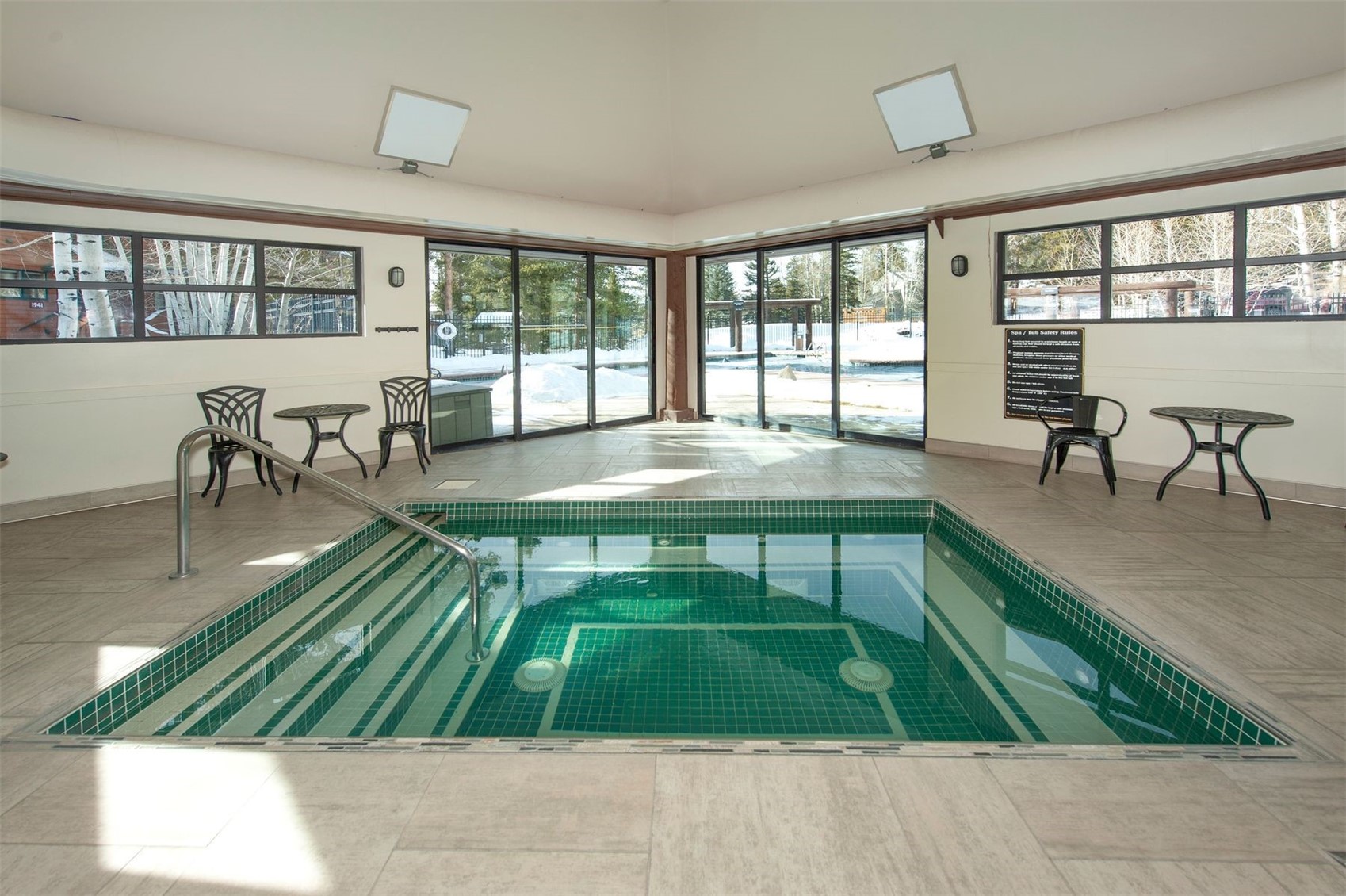 352 Wild Irishman Road, Unit 1907 Keystone, CO 80435 - Photo 42 of 43 a living room with a floor to ceiling windows and pool table