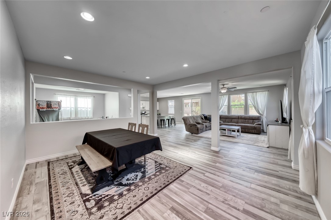 723 Gorringe Ridge Court Henderson, NV 89002 - Photo 11 of 48 Dining room featuring recessed lighting, light wood-type flooring, and a ceiling fan
