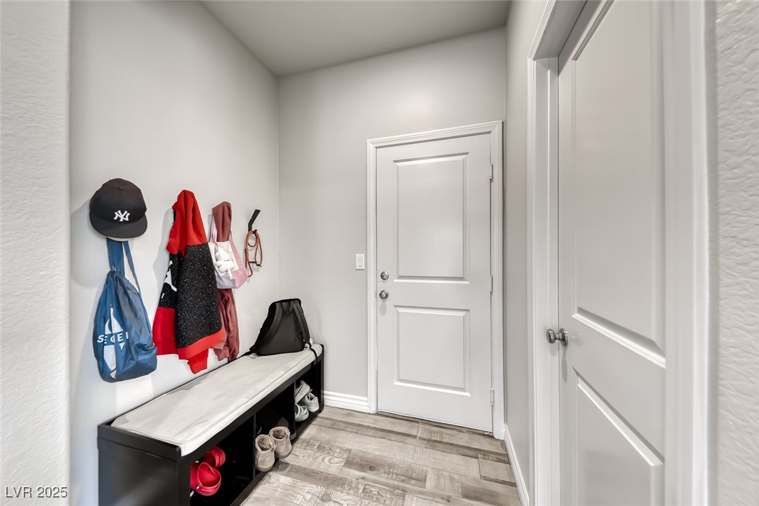 723 Gorringe Ridge Court Henderson, NV 89002 - Photo 34 of 48 Mudroom with light wood-style flooring and baseboards