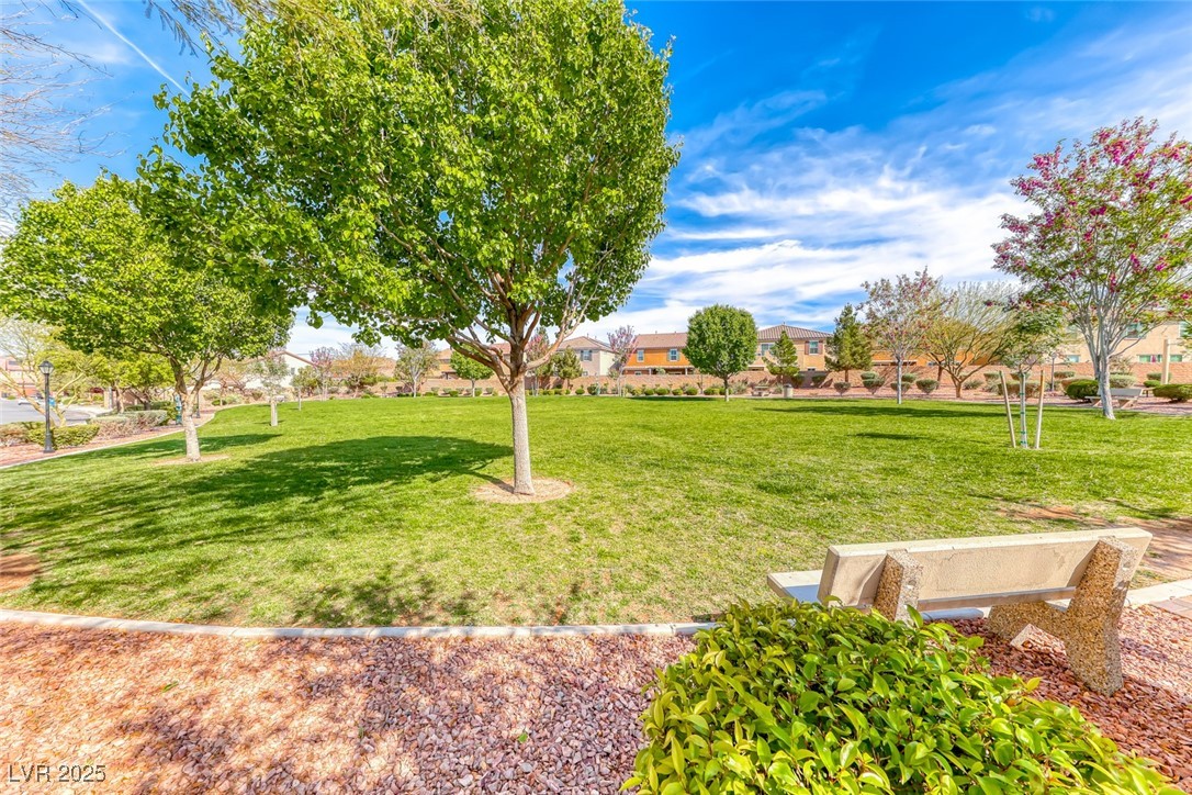723 Gorringe Ridge Court Henderson, NV 89002 - Photo 40 of 48 View of green lawn featuring a residential view