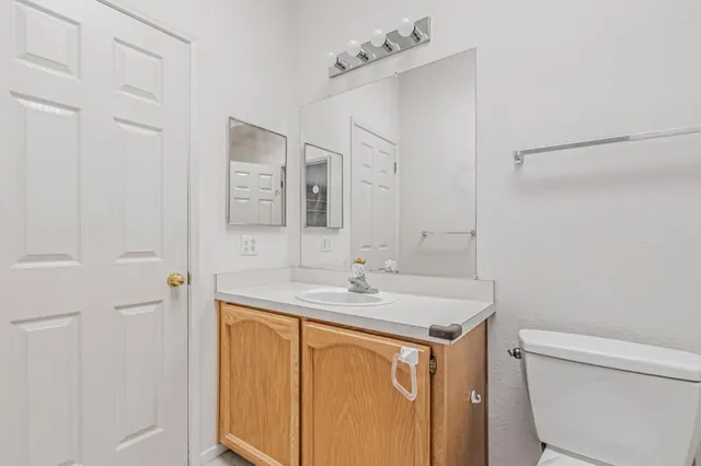 a bathroom with a sink and a toilet