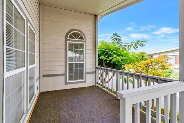 a view of balcony with garden