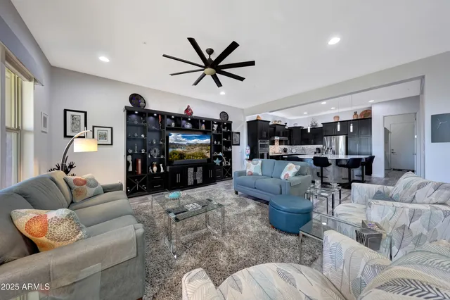 a spacious bathroom with a shower a sink and a mirror