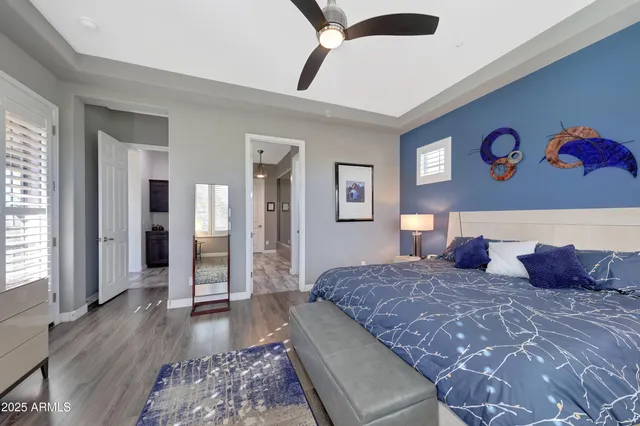 a large bathroom with a double vanity sink and a mirror